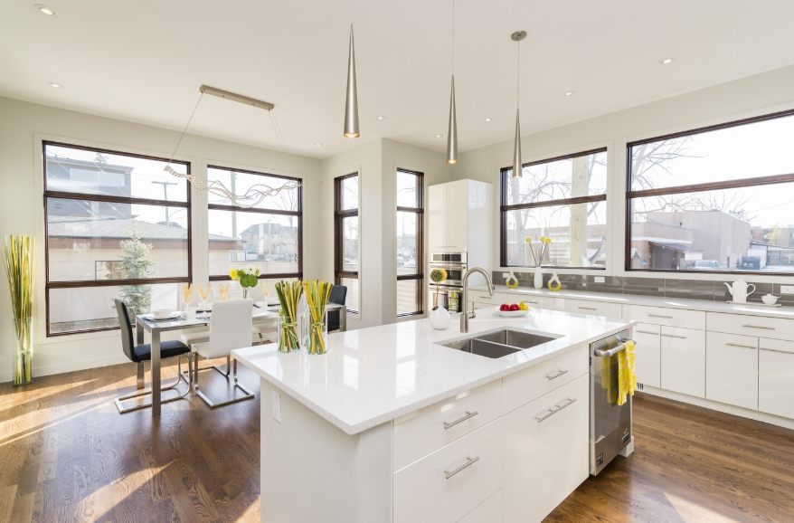 modern kitchen with island and lighting showing kitchen upgrades that increase home value