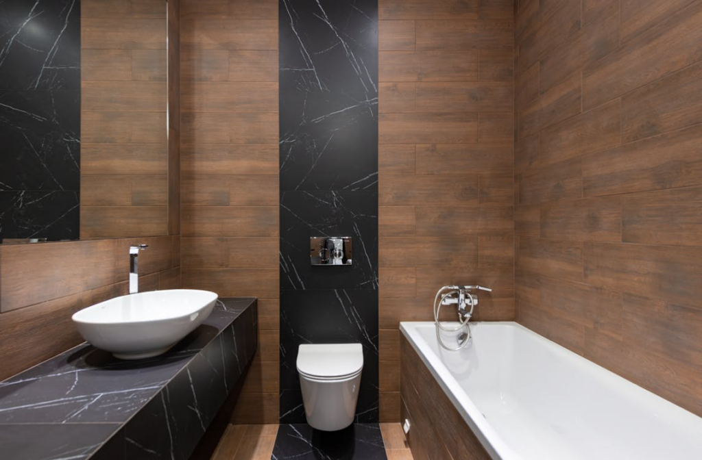 modern bathroom renovation with fixtures and tile showing renovations that increase home value the most