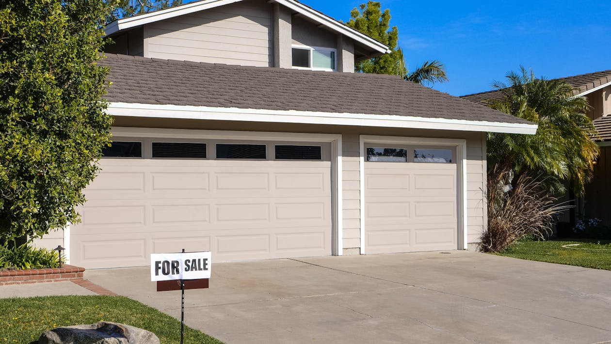 how garage space affects home value with multi-car garage and driveway