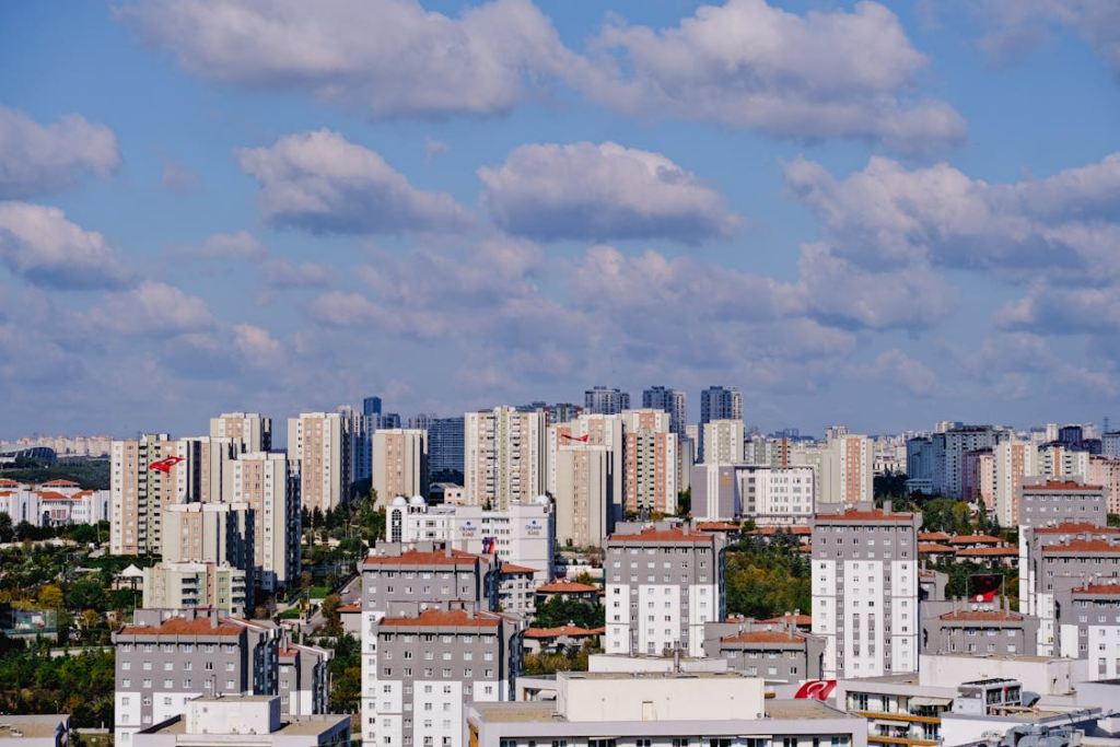 city skyline illustrating how economic conditions affect housing market trends