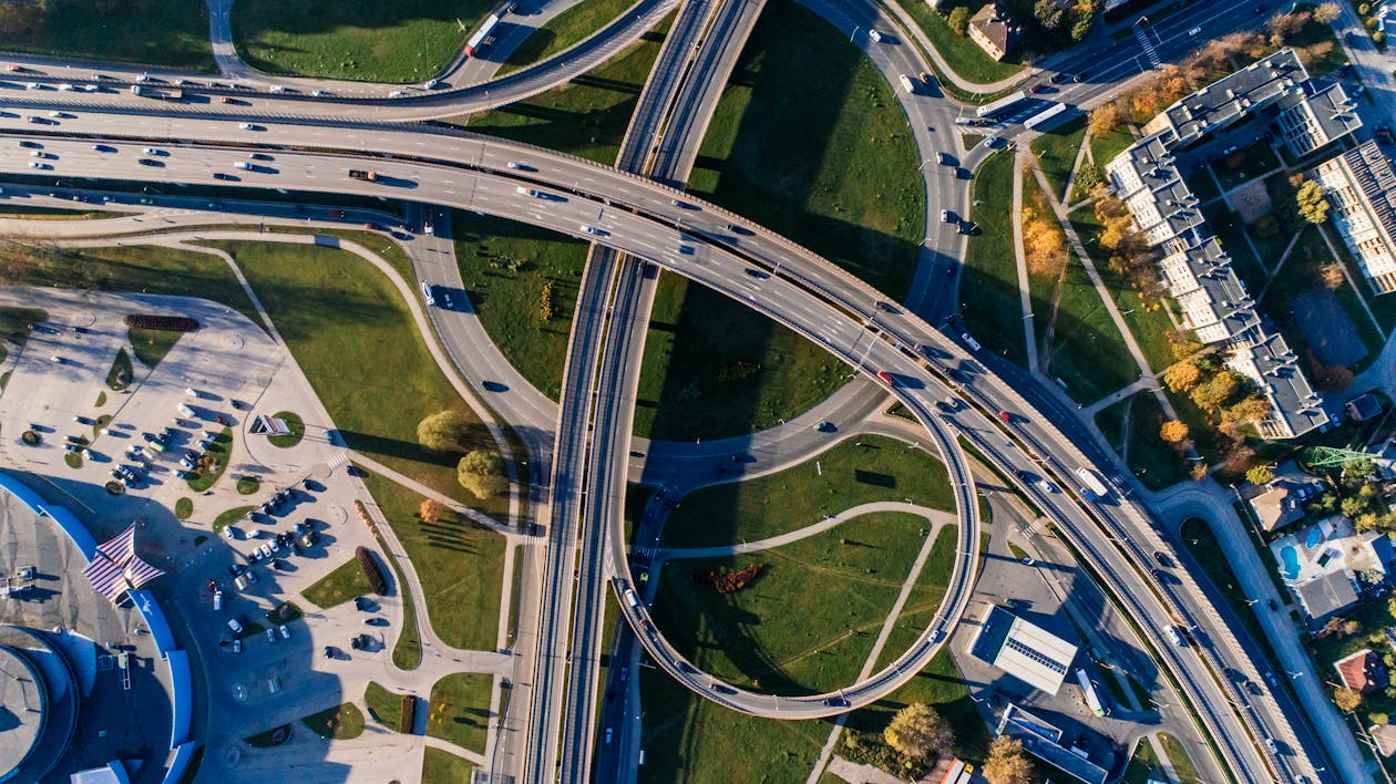 aerial view of highway expansion showing how local development property values increase with improved infrastructure